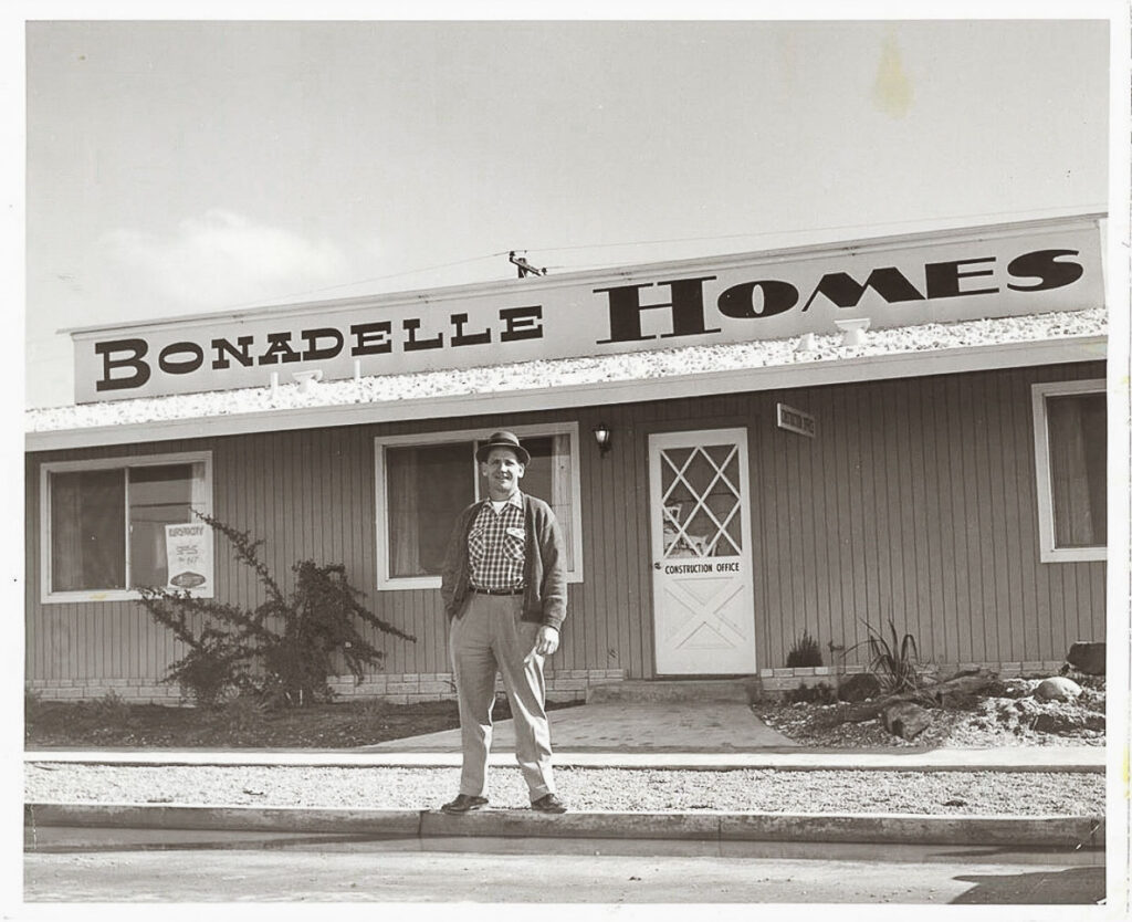 John Bonadelle outside of the original Bonadelle Homes construction office.